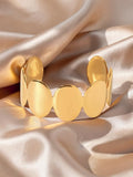 Modern Muse Disc Cuff